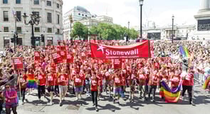 Photo of the Stonewall team leading an LGBT pride march