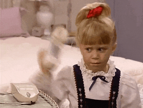 GIF of Michelle Tanner hanging up phone