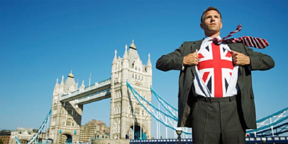 Photo of British man in front of London Bridge Photo of British man in front of London Bridge