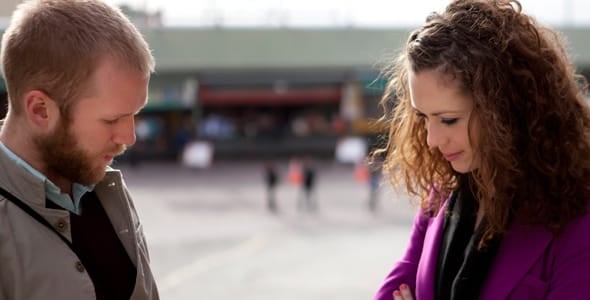 Photo of a man and woman talking