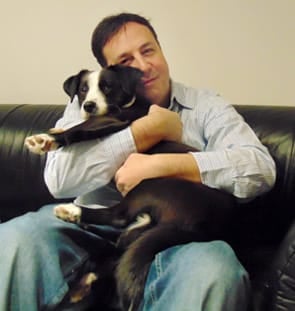 Photo of Darrell Lerner and his dog, Kona