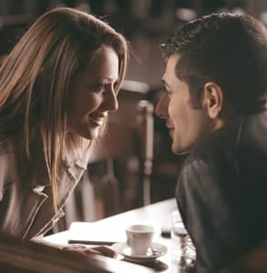 Picture of a couple leaning toward each other