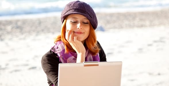 Photo of a girl on her laptop Photo of a girl on her laptop