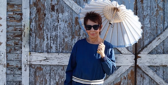 Photo of Dorrie Jacobson with a parasol Photo of Dorrie Jacobson with a parasol