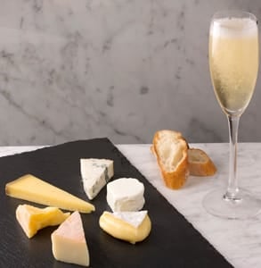 Photo of cheese and champagne