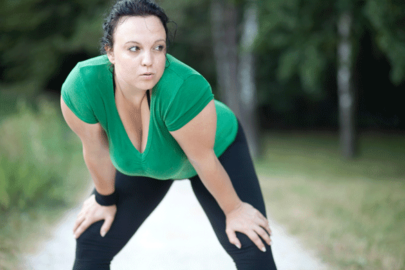 Photo of a woman exercising Photo of a woman exercising