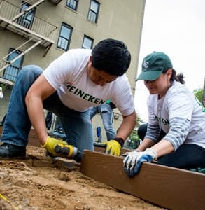 Photo of GrowNYC volunteers building a garden