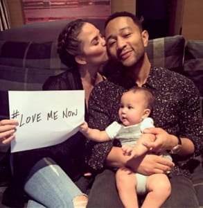 Photo of Chrissy Teigen, John Legend, and their daughter, Luna
