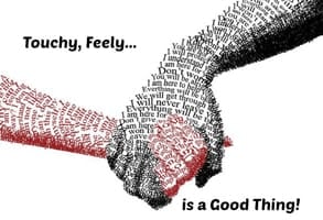 Photo of clasped hands made of words
