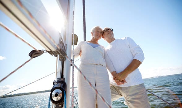 Photo of an older couple sailing