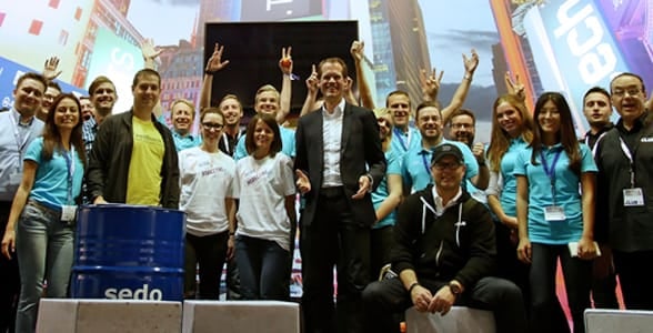 Photo of Sedo team members at a convention in 2015