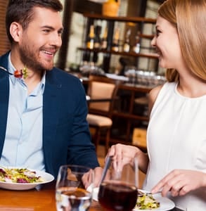 Photo of a couple eating together