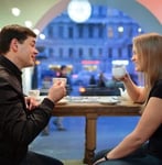 Photo of a couple talking on a date