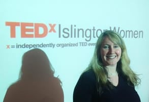 Photo of Elizabeth Sullivan giving a TED Talk