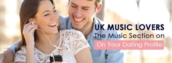 Couple listening to music with earbuds from a smartphone in a park with an urban background