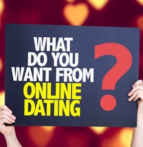 Photo of a sign reading what do you want from online dating Photo of a sign reading what do you want from online dating