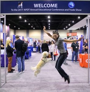 Photo of a dog owner and her dog at the APDT's conference Photo of a dog owner and her dog at the APDT's conference