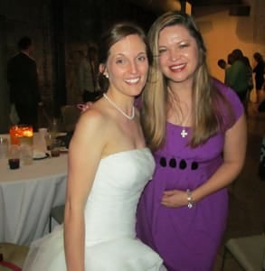 Photo of Anna with a bride who met her husband while speed dating