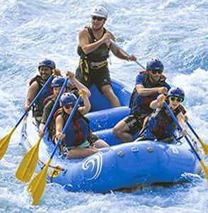 Photo of a group whitewater rafting on the Oklahoma River