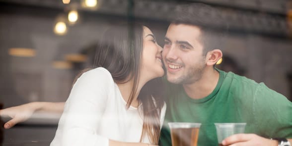 Photo of a couple flirting