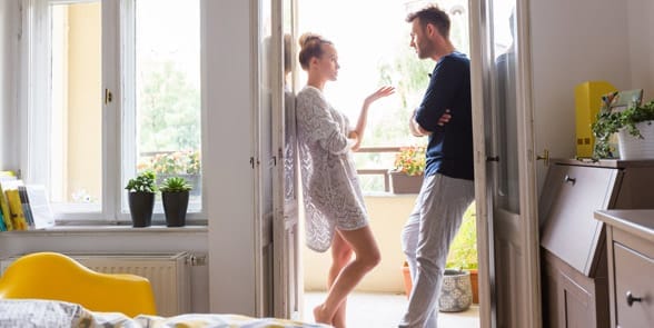 Photo of a woman trying to change her boyfriend Photo of a woman trying to change her boyfriend