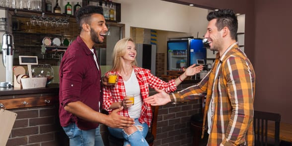 Photo of friends introducing each other