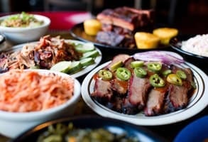 Photo of barbecue food at Dinosaur Bar-B-Que Photo of barbecue food at Dinosaur Bar-B-Que