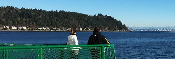 Photo of a couple on a ferry in the Kitsap Peninsula