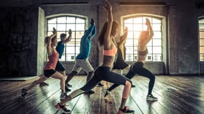 Photo of a people taking a gym class Photo of a people taking a gym class