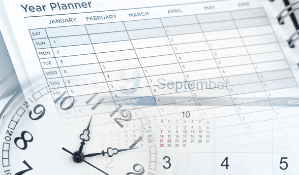 Photo of a clock and calendar Photo of a clock and calendar