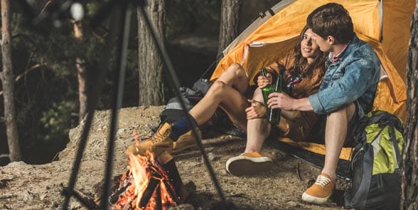 Photo of a couple camping Photo of a couple camping