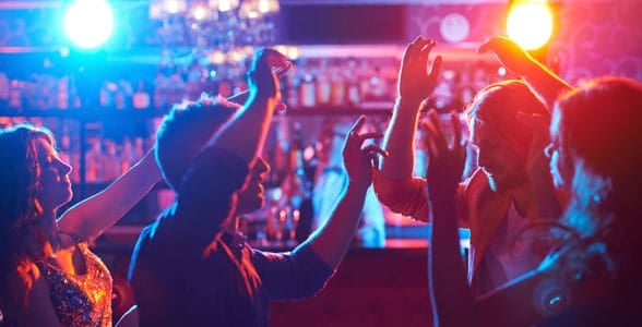 Photo of people dancing at a club