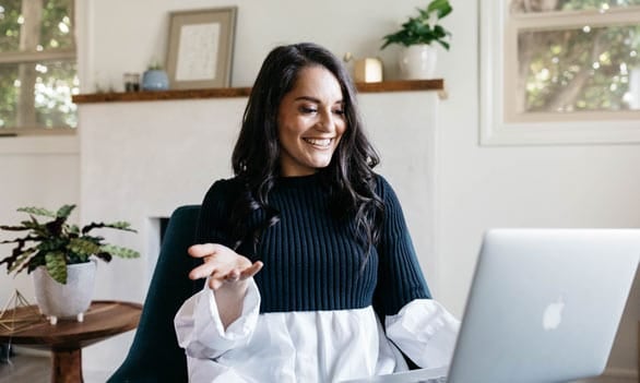 Photo of Vanessa Marin corresponding with a client