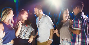 Photo of couples at a club Photo of couples at a club