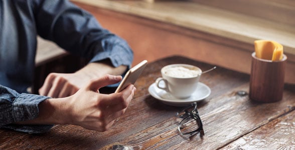 Photo of a man texting