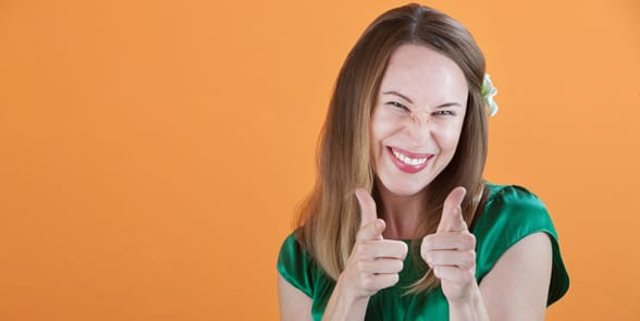 Photo of a woman pointing her index fingers