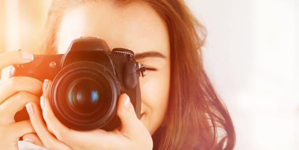 Photo of a woman taking a photo