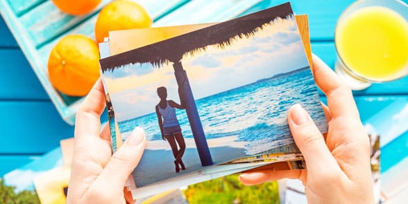 Photo of someone looking at a bunch of photos