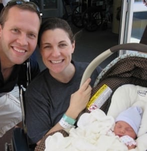 Photo of Adam and Elizabeth with their baby