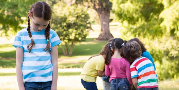 Photo of a child being left out