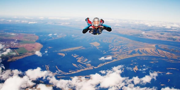 Photo of a man skydiving