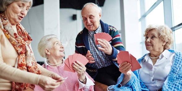 Photo of people playing cards