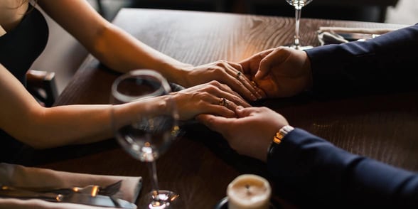 Photo of a couple holding hands