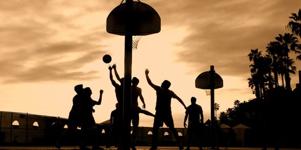 Photo of people playing basketball