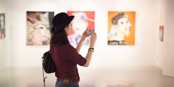 Photo of a woman at an art gallery