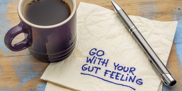 Photo of gut feeling written on a napkin