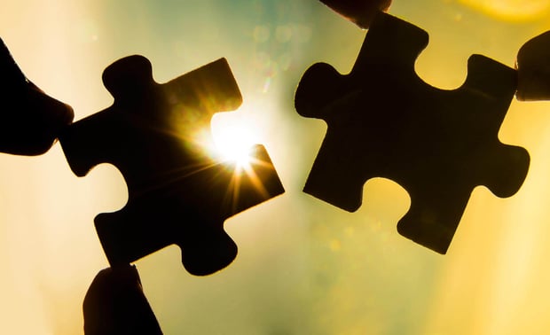 Photo of two puzzle pieces