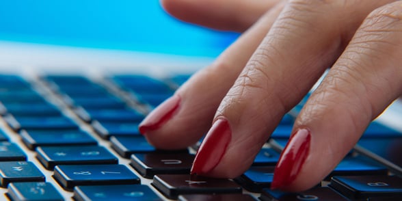 Photo of fingers on a keyboard