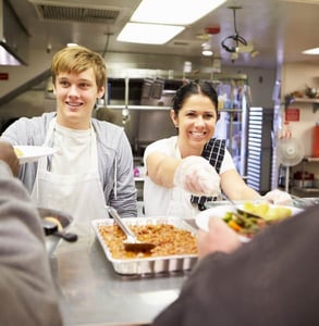 Photo of volunteers at a soup kitchen