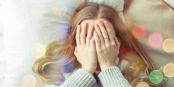 Photo of a woman hiding her face Photo of a woman hiding her face